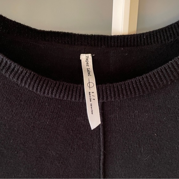 Long sweater with side slits, hits mid calf. Nice over leggings or jeans. - Picture 3 of 4